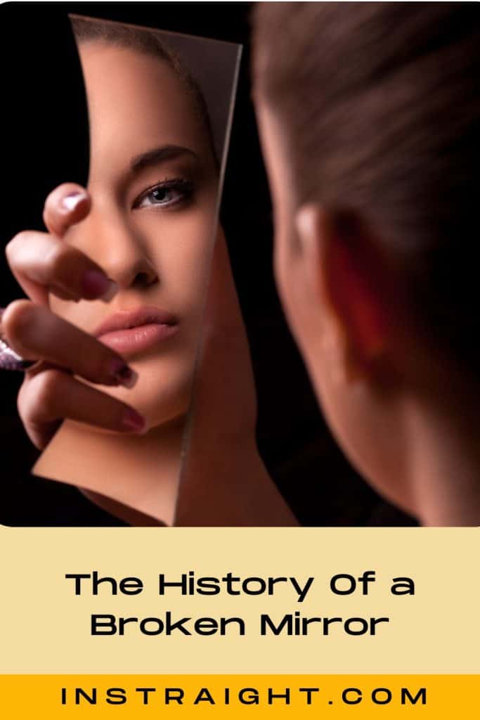 lady looking at the broken mirror